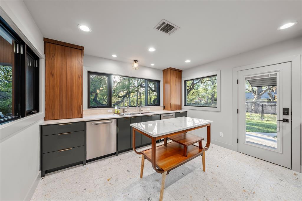 3400 MacArthur Drive Waco, TX 76708 - Photo 14 of 40 Kitchen window overlooks the pool and mature trees