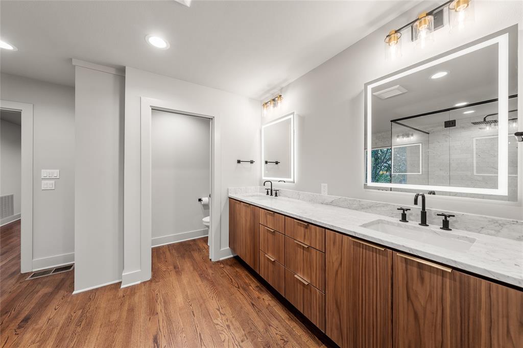 3400 MacArthur Drive Waco, TX 76708 - Photo 23 of 40 Primary Bathroom with dual sinks and imported Italian marble