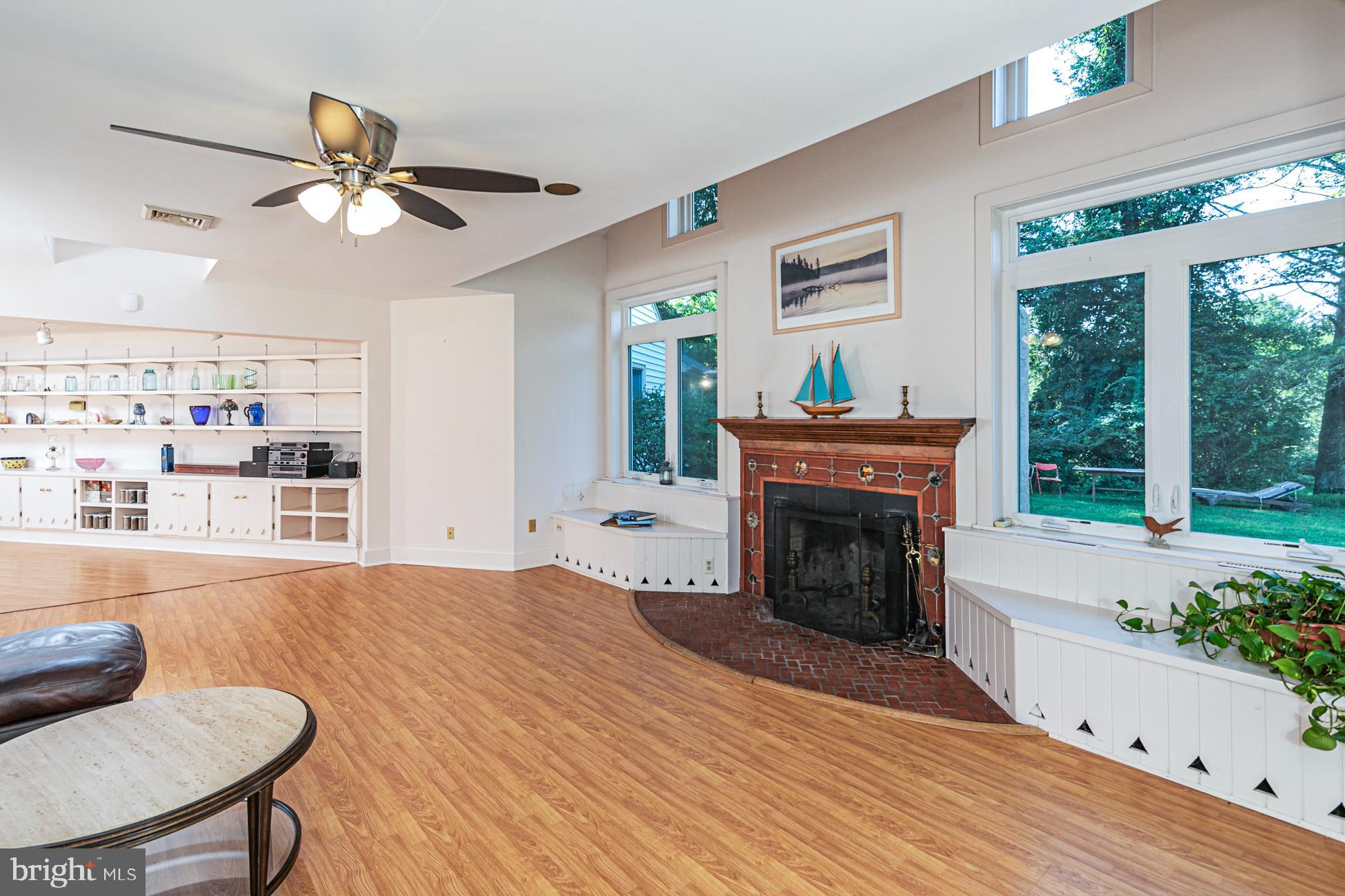 1146 Wrightstown Road Newtown, PA 18940 - Photo 6 of 35 Living room with fireplace with Mercer tiile