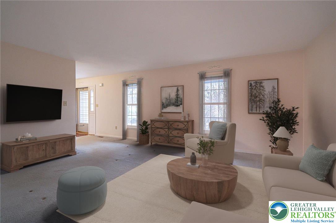 40 Elk Court Reading, PA 19606 - Photo 11 of 46 a living room with furniture and a flat screen tv