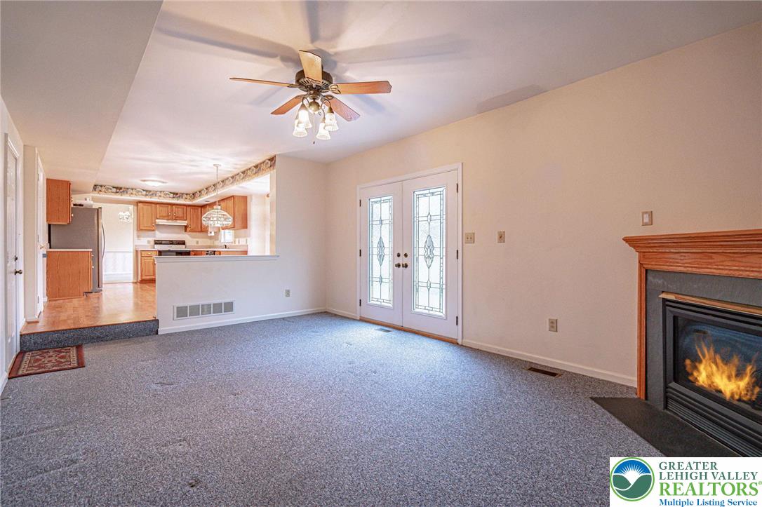 40 Elk Court Reading, PA 19606 - Photo 24 of 46 a view of an empty room with a fireplace and a window