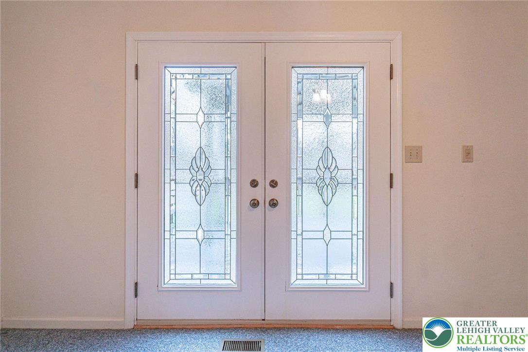 40 Elk Court Reading, PA 19606 - Photo 25 of 46 a view of front door with wooden floor