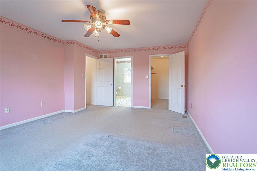 40 Elk Court Reading, PA 19606 - Photo 29 of 46 a view of an empty room with a chandelier fan