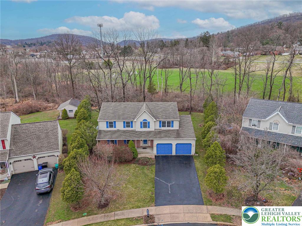 40 Elk Court Reading, PA 19606 - Photo 3 of 46 an aerial view of a house with a garden