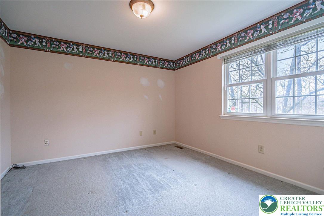 40 Elk Court Reading, PA 19606 - Photo 38 of 46 a view of a room with window and a chandelier fan