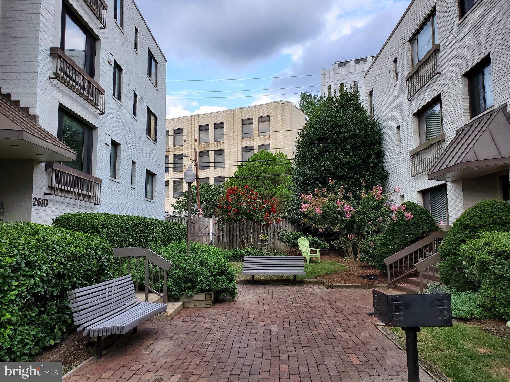 2610 Tunlaw Road Northwest, Unit 103 Washington, DC 20007 - Photo 2 of 36 a view of outdoor space yard and patio