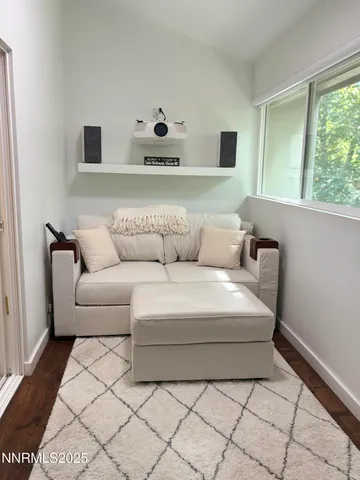 a spacious bathroom with a double vanity sink and a mirror