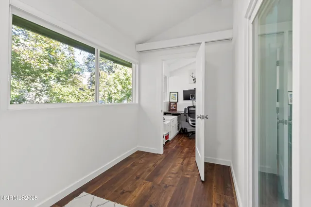 a view of balcony with furniture