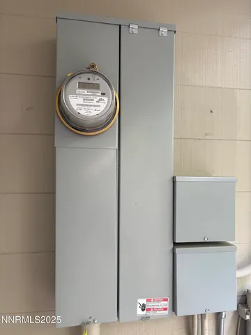 an aerial view of a house with a yard lake view