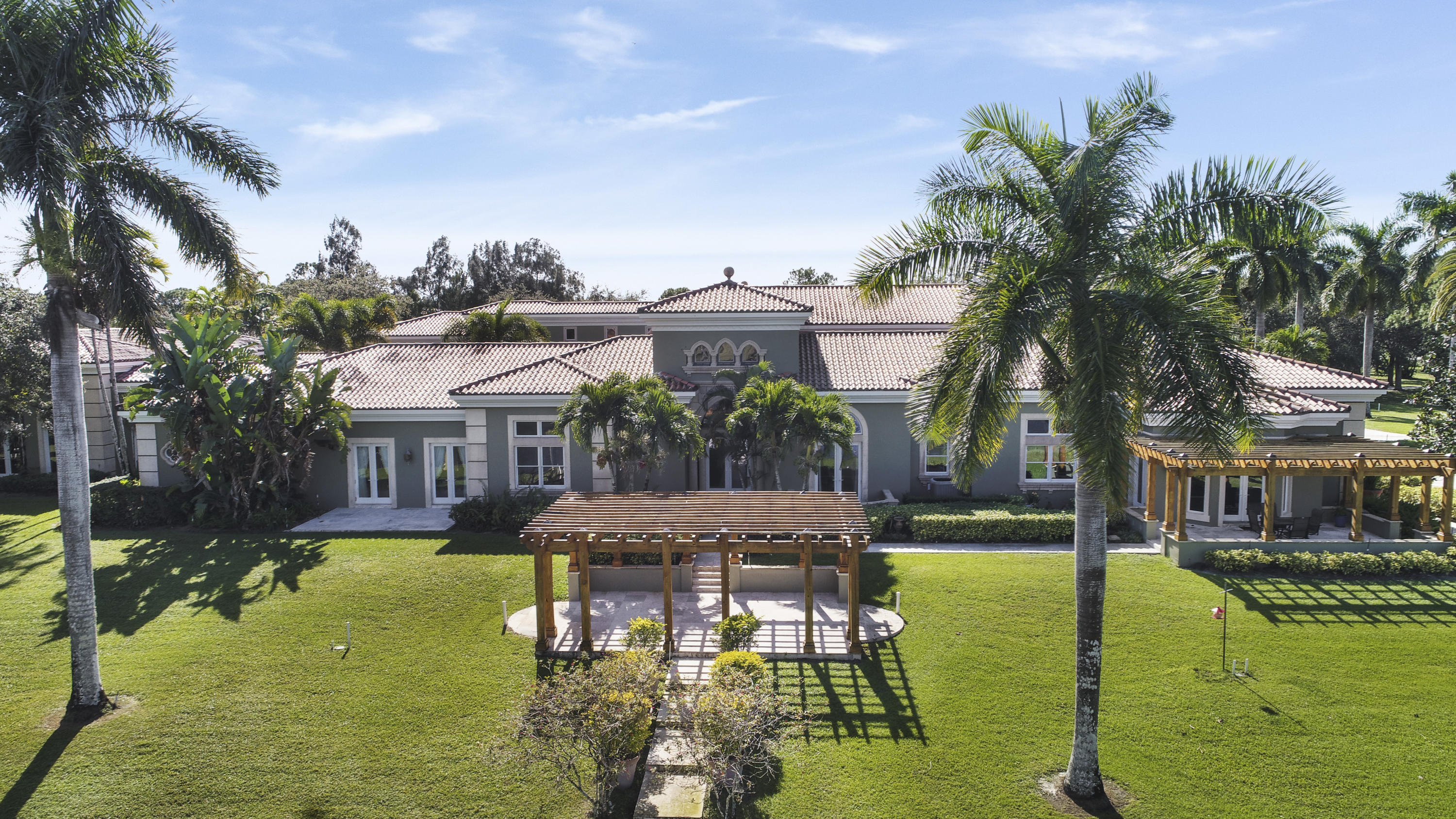 18803 Southeast Ranch Lane Jupiter, FL 33478 - Photo 1 of 29 Northern elevation of residence