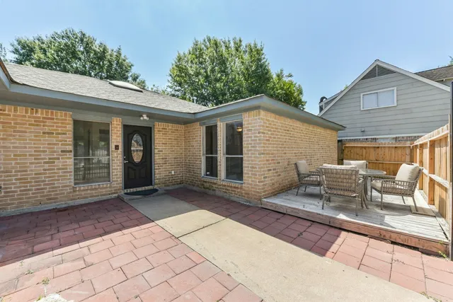 a view of a house with a patio