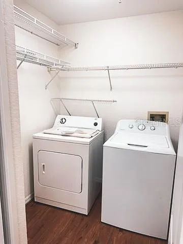 a utility room with dryer and washer