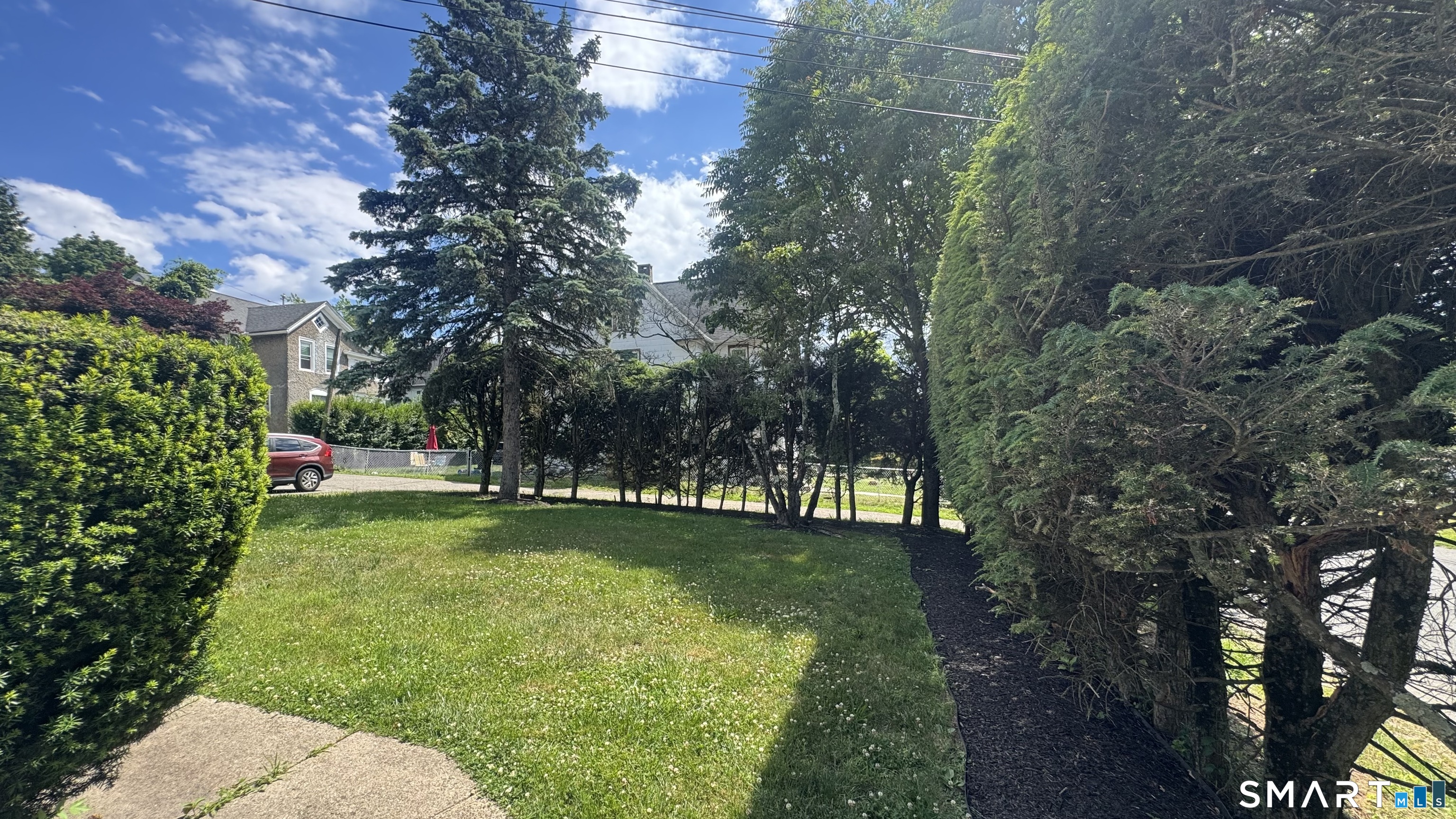 104 Prospect Street Ansonia, CT 06401 - Photo 4 of 40 a view of a park with large trees