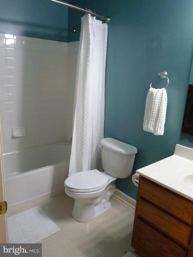 3721 Katie Place Triangle, VA 22172 - Photo 2 of 27 a bathroom with a toilet and a shower