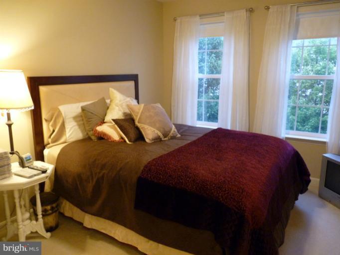 3721 Katie Place Triangle, VA 22172 - Photo 11 of 27 a bedroom with a bed and window