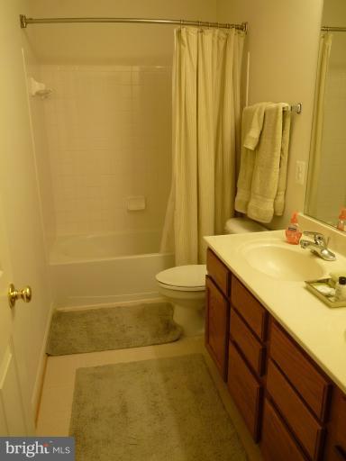 3721 Katie Place Triangle, VA 22172 - Photo 13 of 27 a bathroom with a sink a toilet and shower