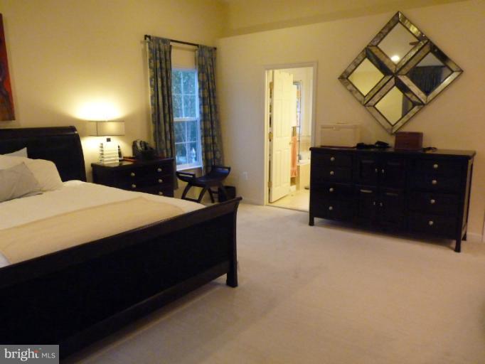 3721 Katie Place Triangle, VA 22172 - Photo 14 of 27 a bedroom with a bed and window