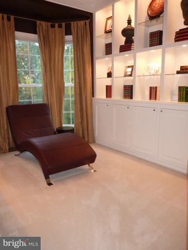 3721 Katie Place Triangle, VA 22172 - Photo 24 of 27 a living room with furniture and large windows