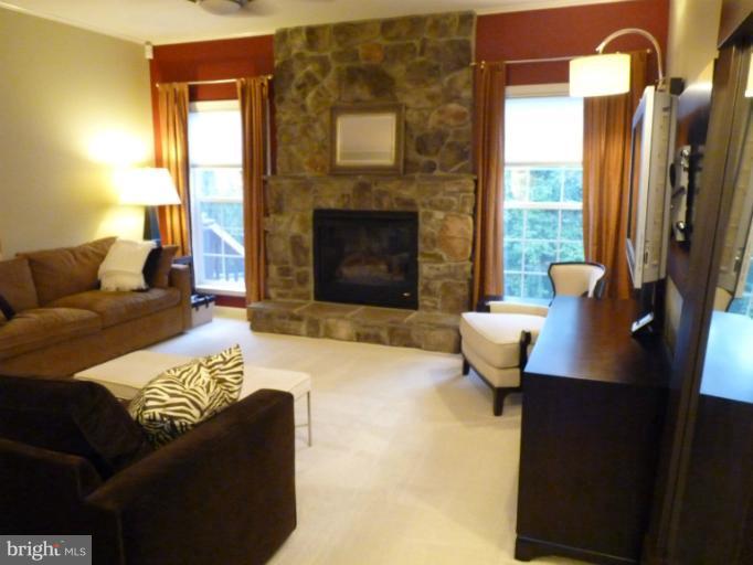 3721 Katie Place Triangle, VA 22172 - Photo 5 of 27 a living room with furniture and a fireplace