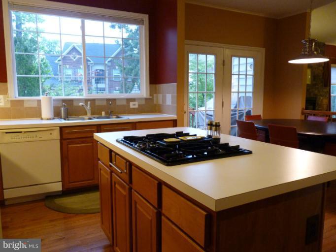 3721 Katie Place Triangle, VA 22172 - Photo 7 of 27 a kitchen with a stove and a sink