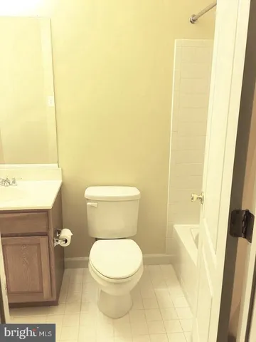 a view of livingroom with furniture and a fireplace
