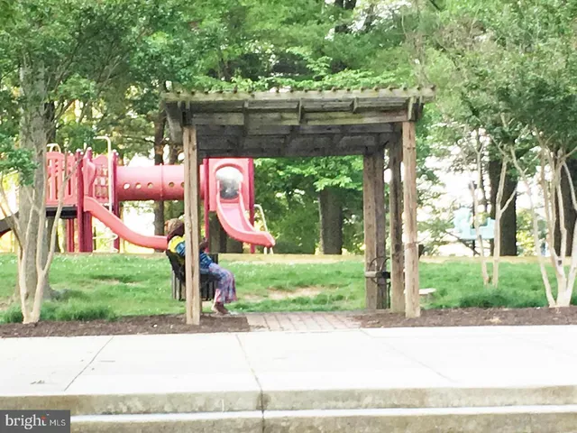 a view of a building with a street