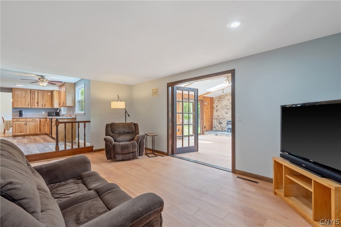 8069 Princess Path Clay, NY 13090 - Photo 18 of 50 The family room has french doors that lead to the