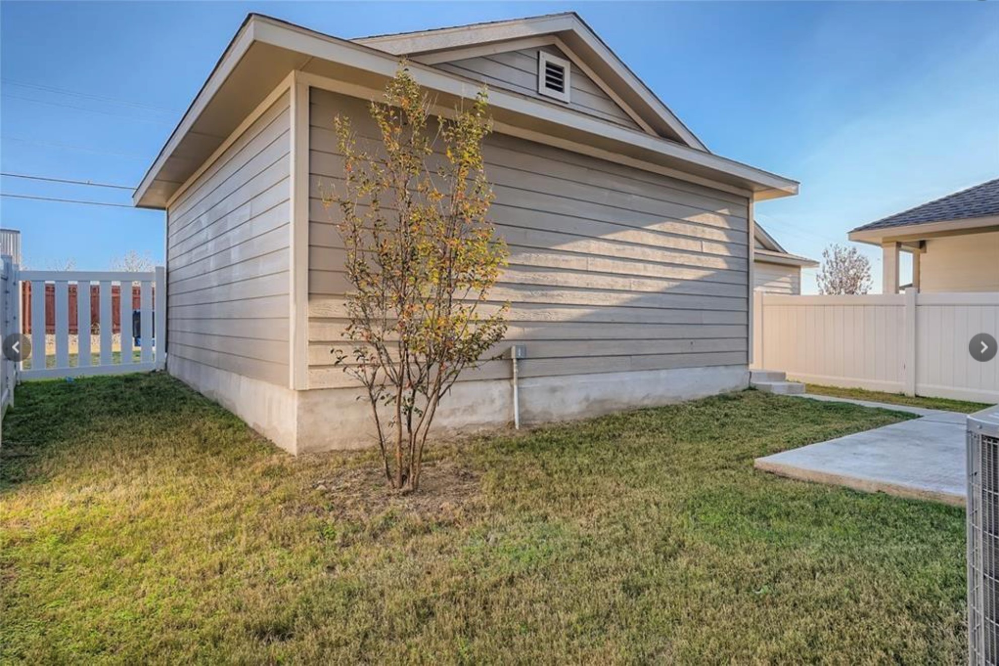 304 Cane River Road Pflugerville, TX 78660 - Photo 28 of 31 Well-maintained fencing encircles a grassy private yard, offering a tranquil outdoor retreat.