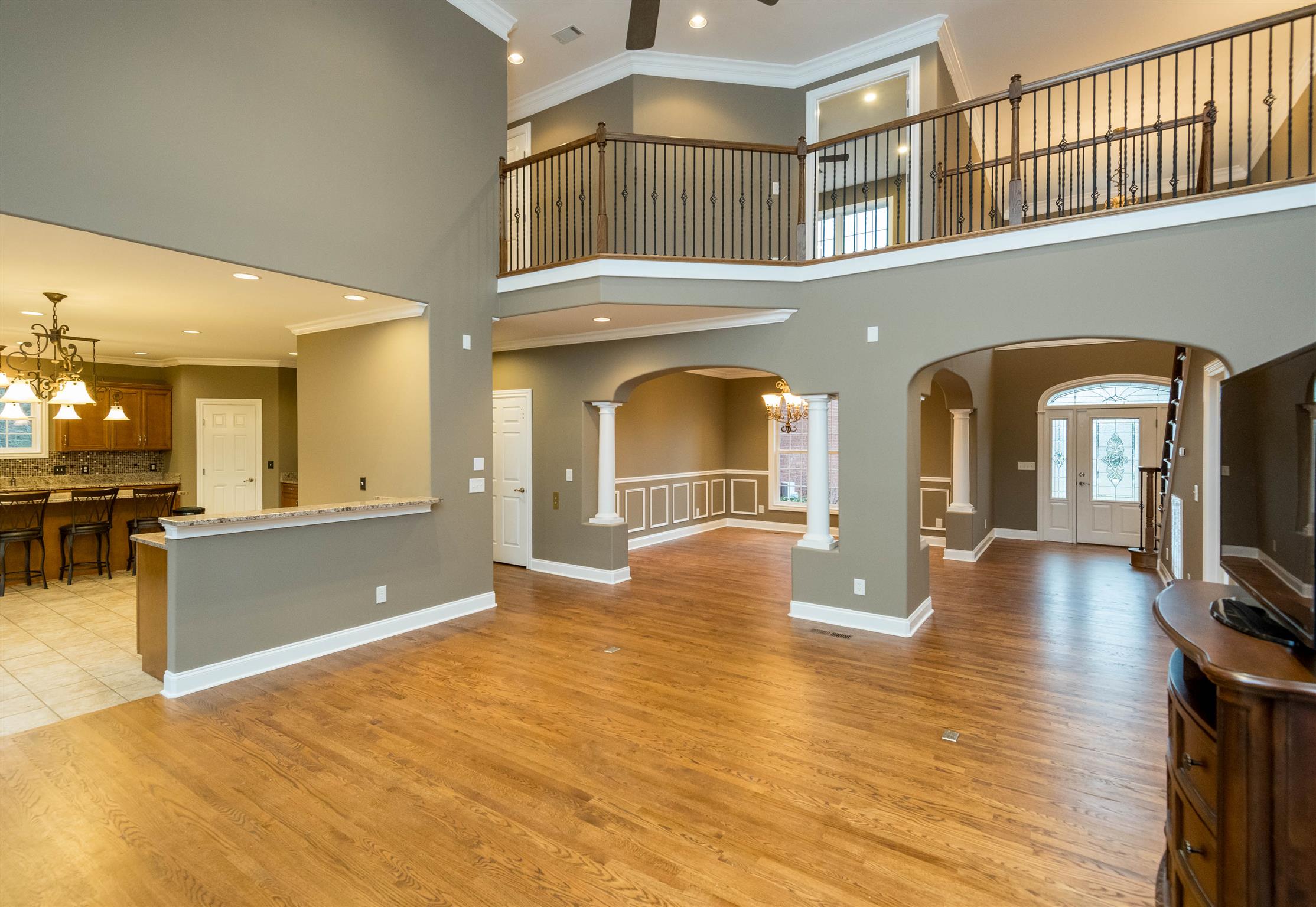 1402 Fellowship Road Mount Juliet, TN 37122 - Photo 4 of 30 Beautiful open plan with details of the custom iron railing above