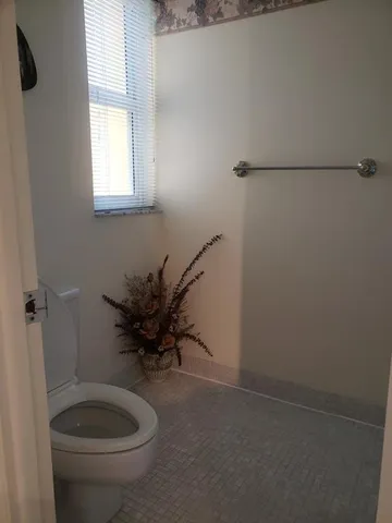 a bathroom with a sink and toilet