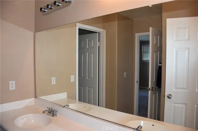 a view of a livingroom with furniture and workspace