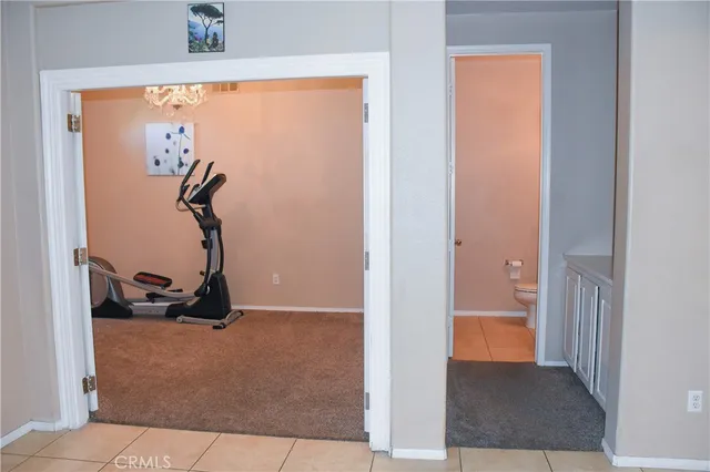 a bathroom with a sink mirror and window
