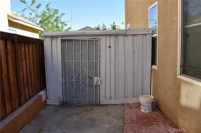a plant sitting in front of a house