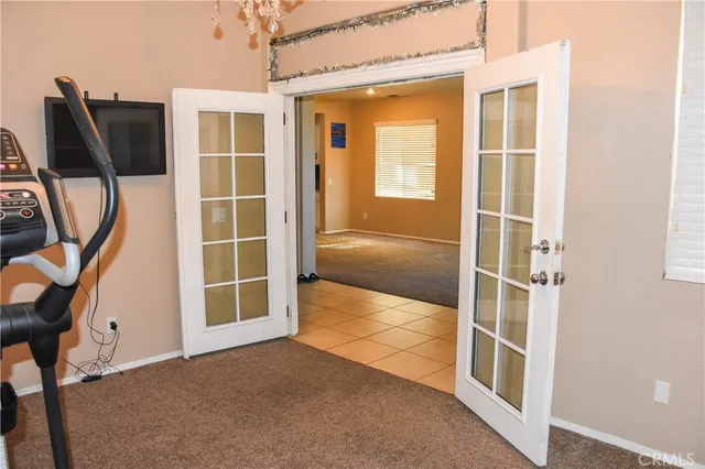 a bathroom with a tub a sink and a window