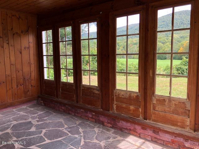 814 River Road Clarksburg, MA 01247 - Photo 3 of 27 a view of empty room with windows