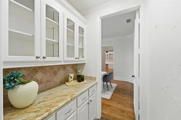 view of living room with furniture and floor to ceiling window