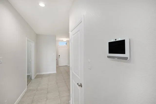 a view of a livingroom from an empty room