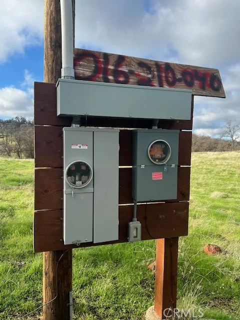 0 Bobcat Road Coarsegold, CA 93614 - Photo 13 of 14 a front view of a house with parking area