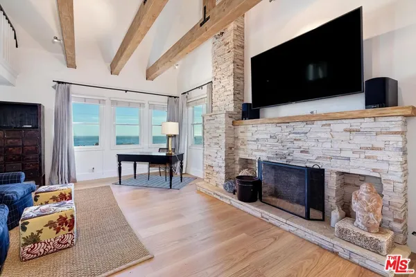a view of a balcony with chairs