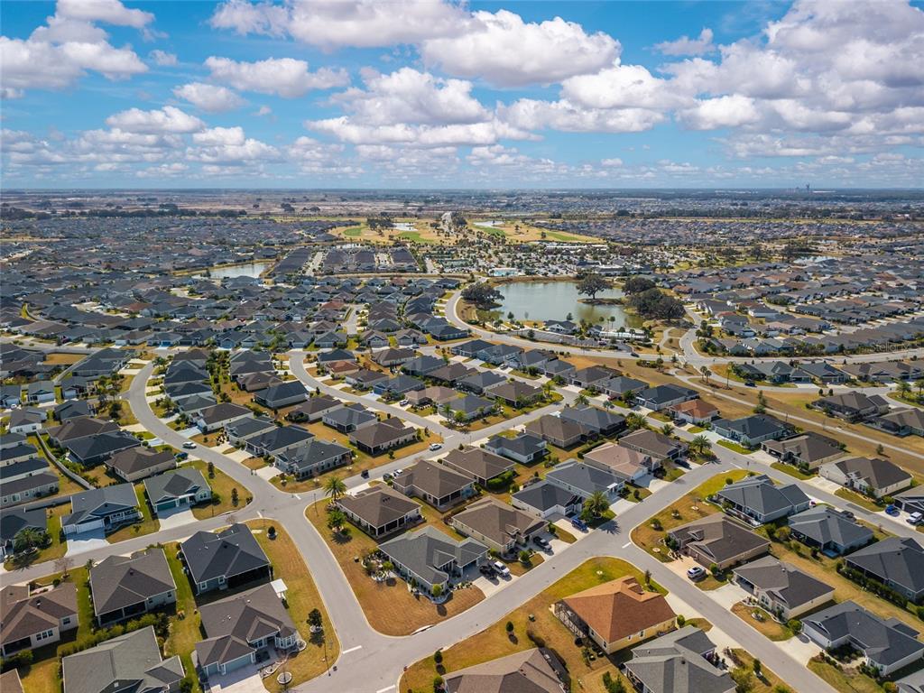 595 Randall Road The Villages, FL 32163 - Photo 40 of 42 an aerial view of multiple house