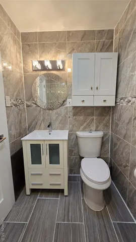 a front view of a house with glass windows