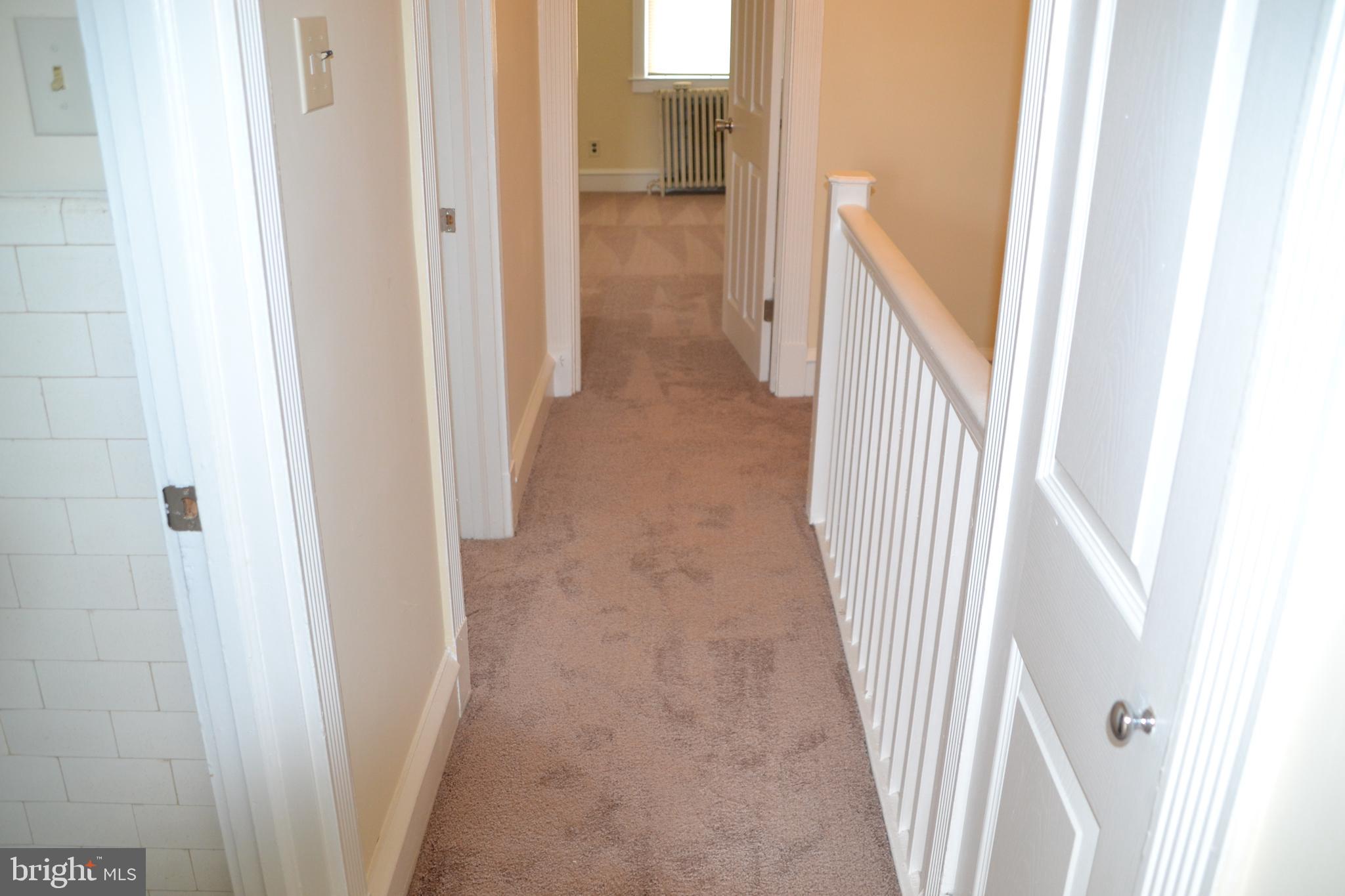 243 Coverly Road Lansdowne, PA 19050 - Photo 21 of 31 a view of a hallway with a hallway