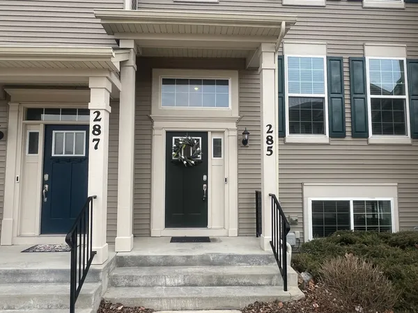 a front view of a house with a entryway
