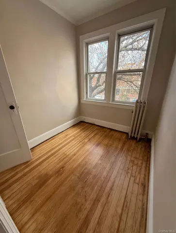 a view of an empty room and window