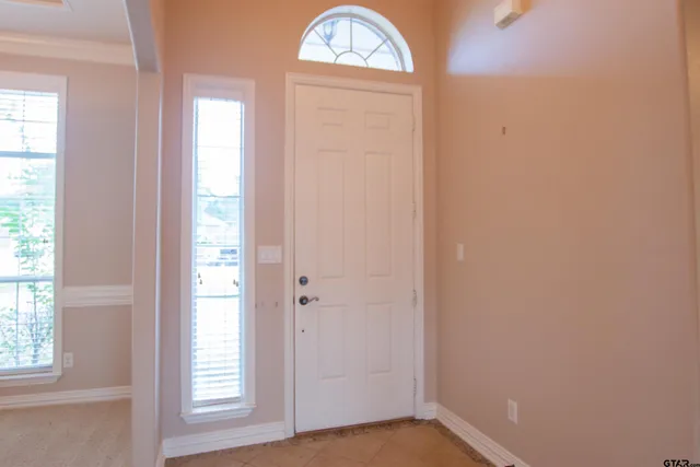 a view of front door with entryway