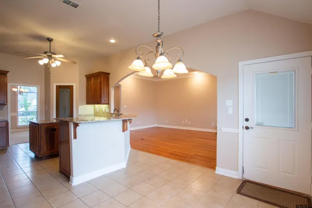 a view of a kitchen and a chandelier