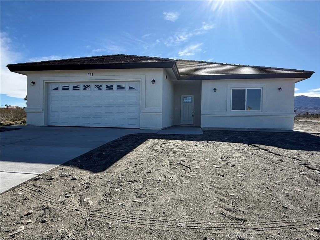 2115 Seville Place Pinon Hills, CA 92372 - Photo 1 of 31 a view of a wooden door