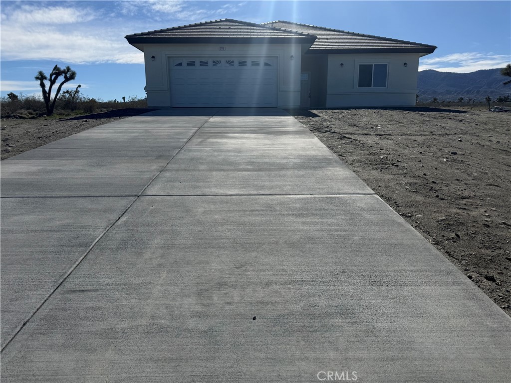 2115 Seville Place Pinon Hills, CA 92372 - Photo 2 of 31 a view of backyard of house