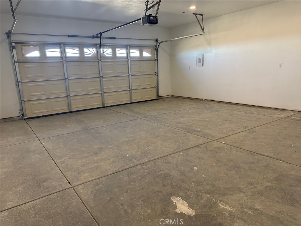 2115 Seville Place Pinon Hills, CA 92372 - Photo 31 of 31 a view of a garage