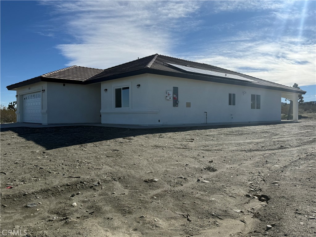2115 Seville Place Pinon Hills, CA 92372 - Photo 4 of 31 a house with a outdoor space